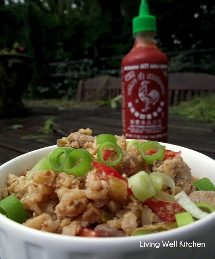 Pork Fried Rice in a bowl with green onions