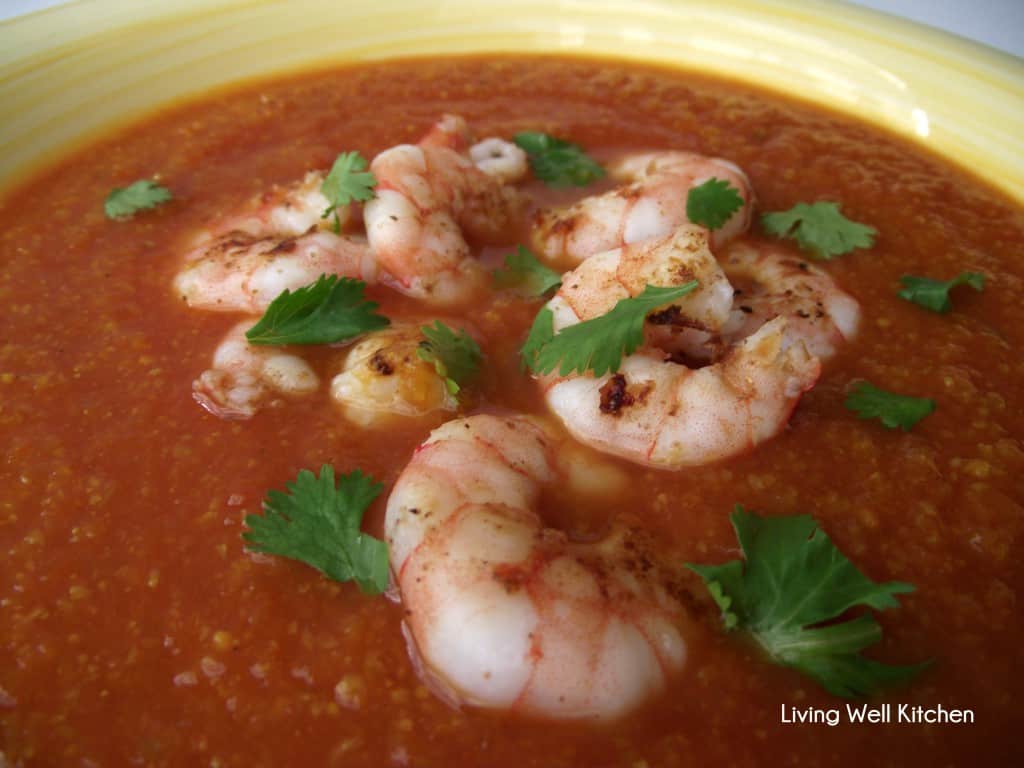 yellow bowl with Indian Tomato Soup topped with shrimp