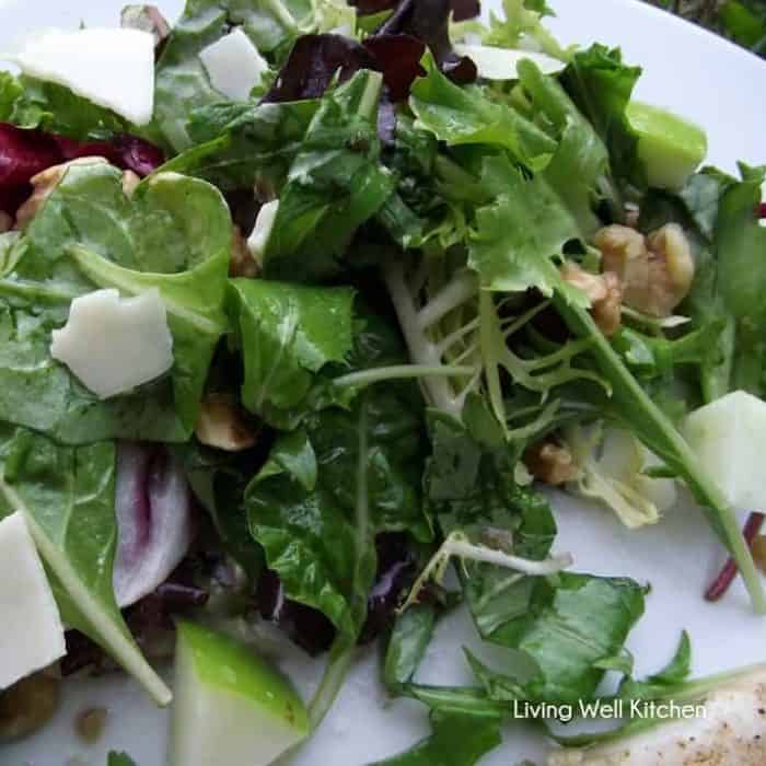 plate of Maple and Orange Winter Salad with Apples, walnuts and parmesan