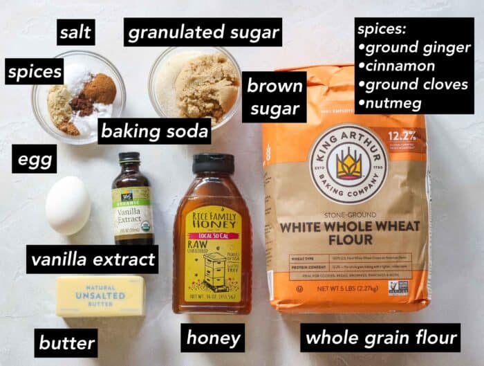 spices, baking soda, salt, granulated sugar, brown sugar, whole grain flour, honey, butter, vanilla extract, egg with text overlay of ingredient description