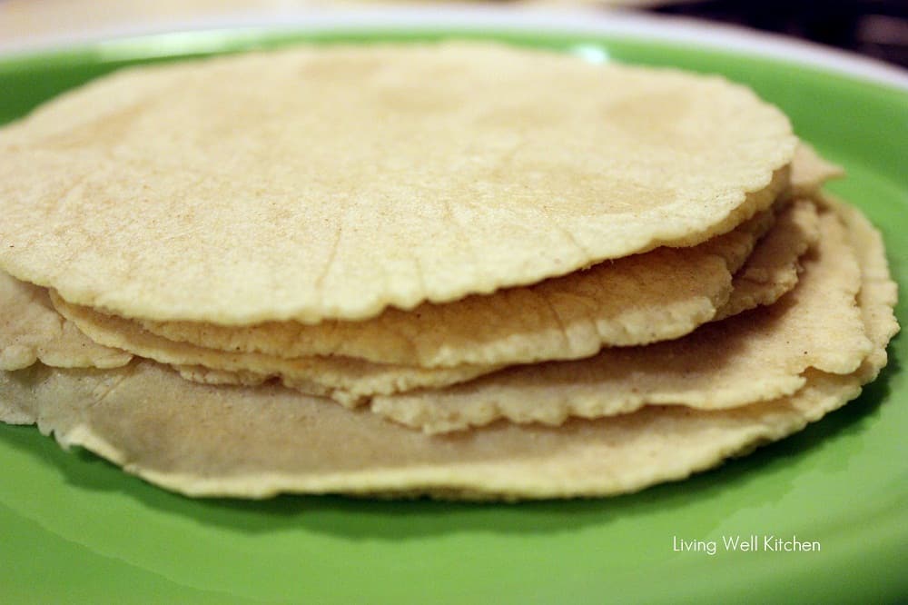 plate with homemade corn tortillas.