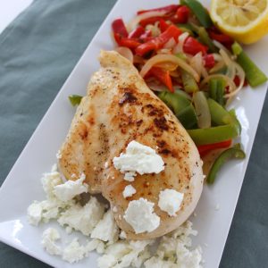 white plate with Goat Cheese covered Chicken