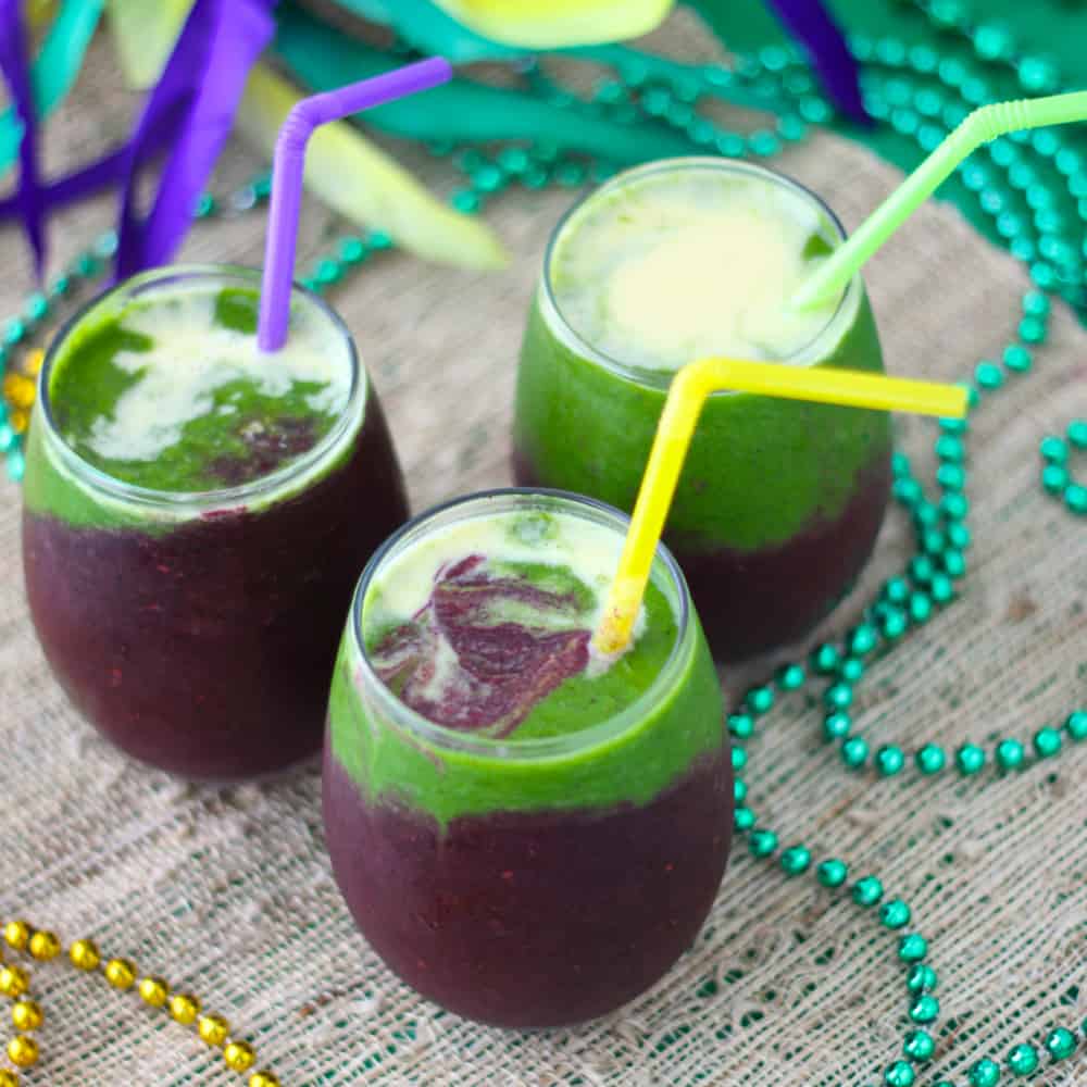 Festive, boozy Mardi Gras Smoothies from Living Well Kitchen are a great on-the-go option for getting in your fruits & veggies while watching the parades roll by
