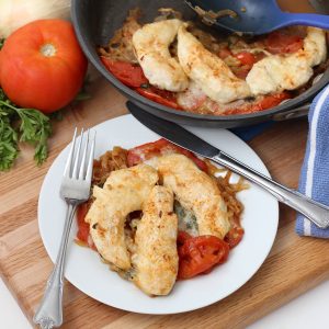 Mozzarella Chicken and Tomatoes in a skillet