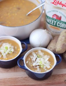 two bowls of Corn and Potato Soup with potatoes, onions, pot of soup