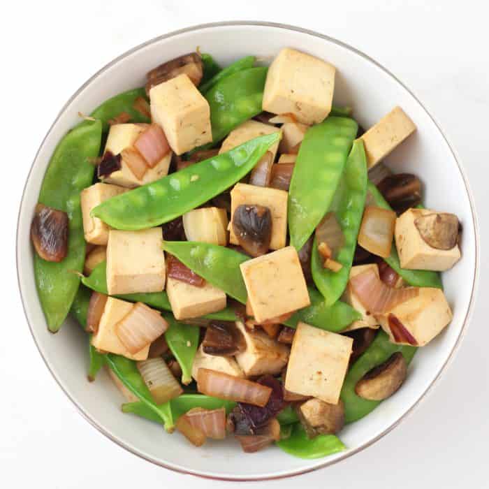 Actually enjoy tofu with this easy & quick dish full of lots of veggies ~ Snap Pea Tofu Stir-fry from @memeinge