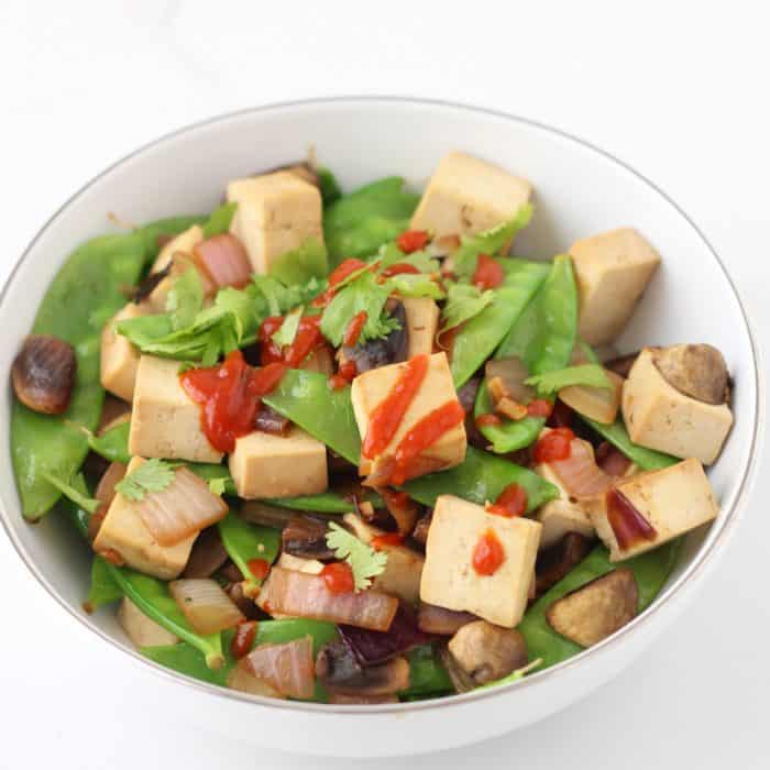 Actually enjoy tofu with this easy & quick dish full of lots of veggies ~ Snap Pea Tofu Stir-fry from @memeinge