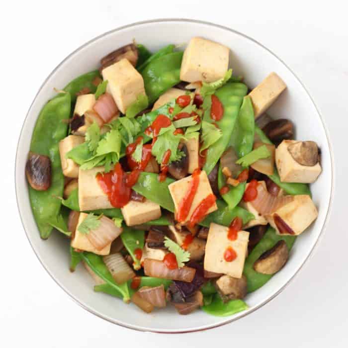 Actually enjoy tofu with this easy & quick dish full of lots of veggies ~ Snap Pea Tofu Stir-fry from @memeinge
