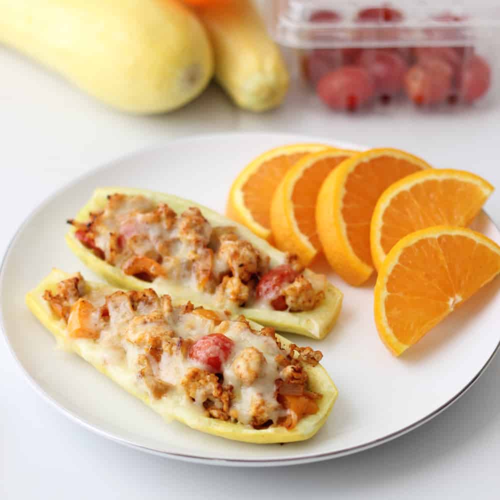 Mexican Stuffed Squash is a great, protein-filled way to use your summer produce from Living Well Kitchen @memeinge