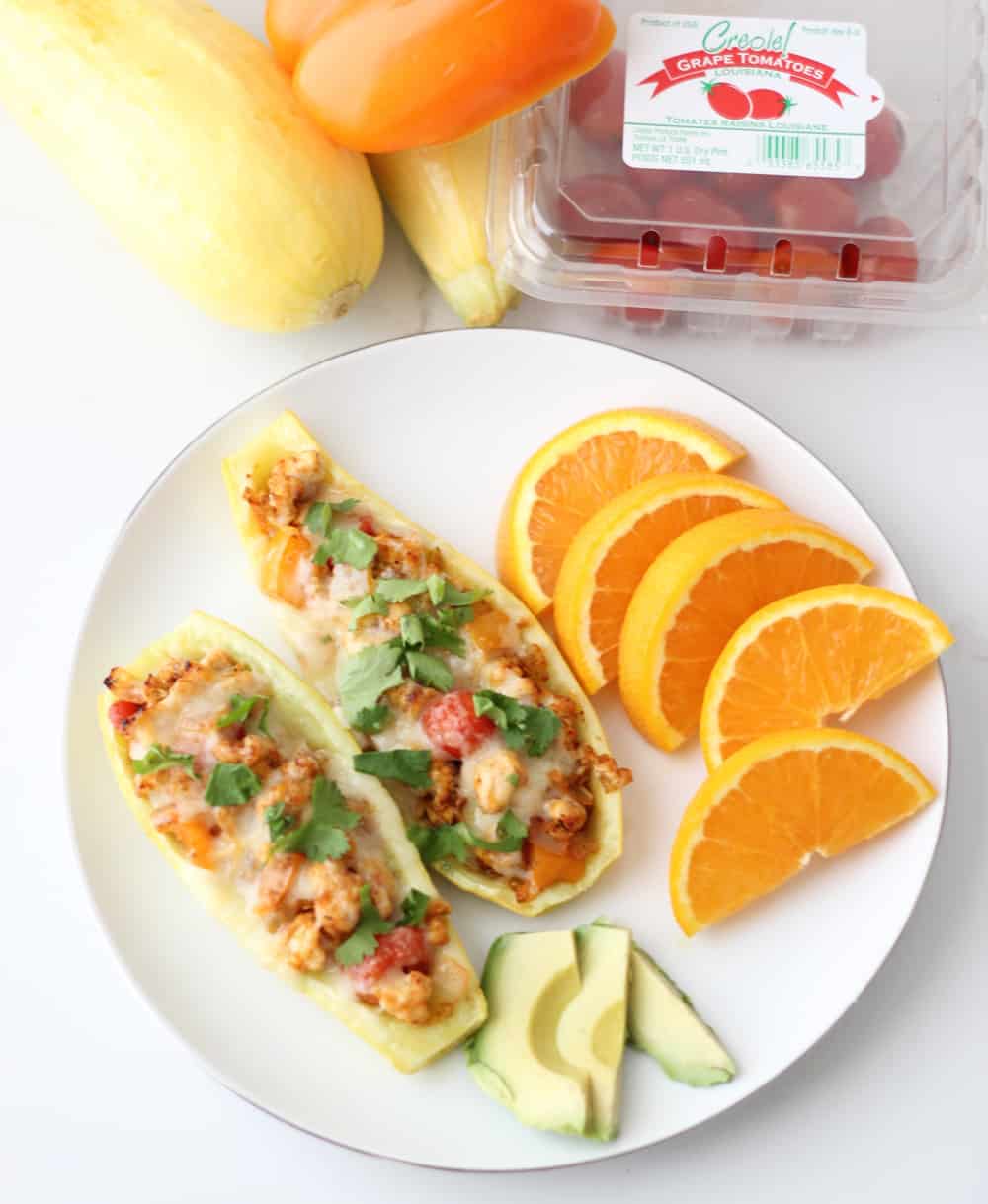 Mexican Stuffed Squash is a great, protein-filled way to use your summer produce from Living Well Kitchen @memeinge