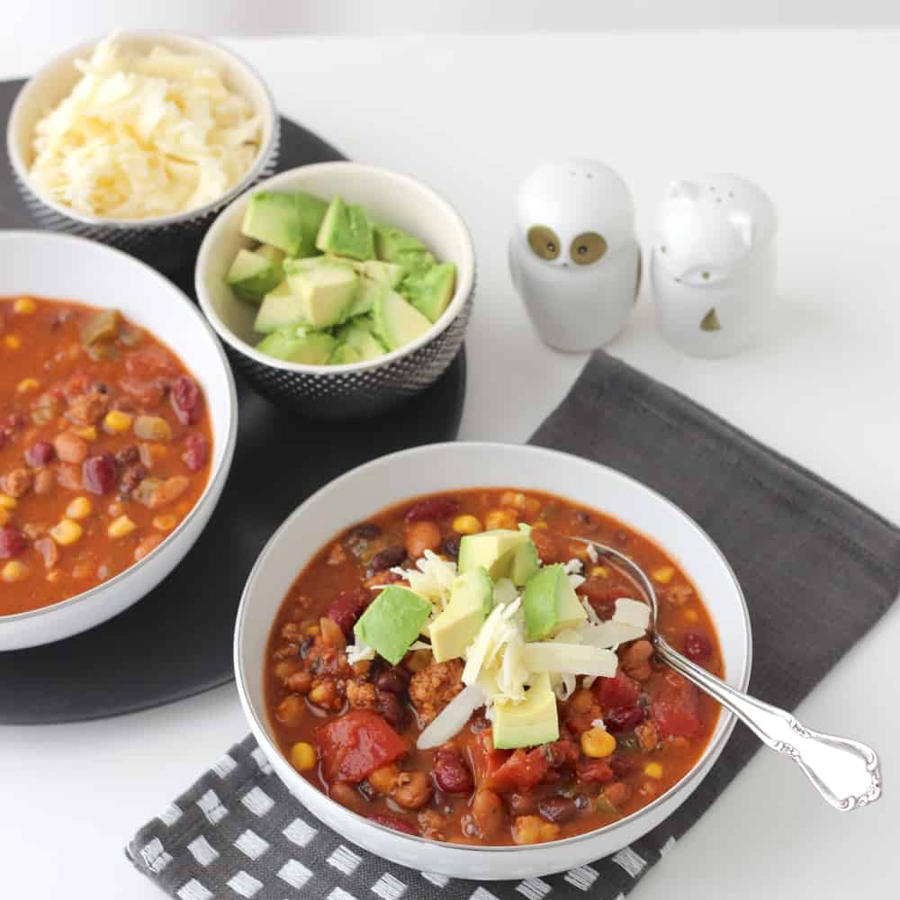 This tried and true recipe for easy Taco Soup from Living Well Kitchen makes enough to serve a hungry crowd plus have leftovers for later