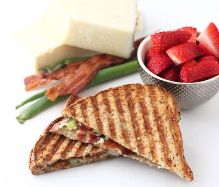 Bacon Grilled Cheese with sliced strawberries, parmesan, green onions, bacon