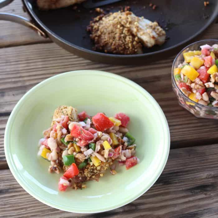 skillet, salsa, and plate with Walnut Crusted Fish with White Bean and Walnut Salsa