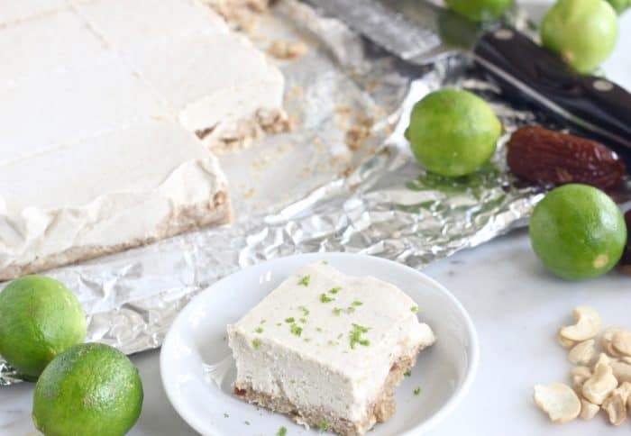 key limes, cashews, dates, Key Lime Pie Bar on plate and bars in background