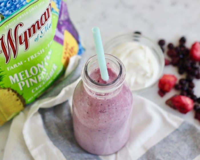 Melon Berry Pineapple with Cucumber Smoothie on white and blue napkin