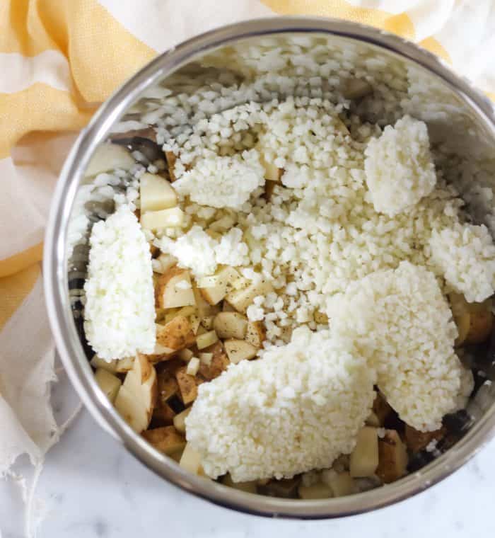 potatoes, cauliflower, salt, pepper in the instant pot