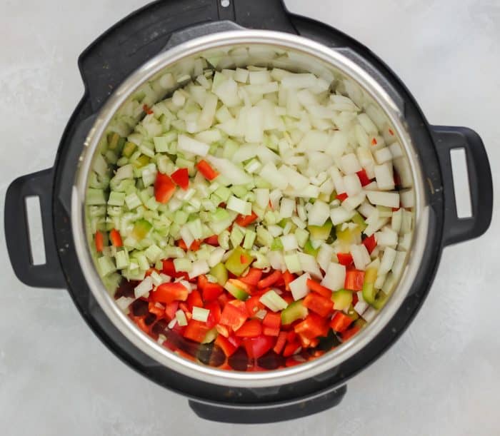 instant pot with bell peppers, celery, and onions