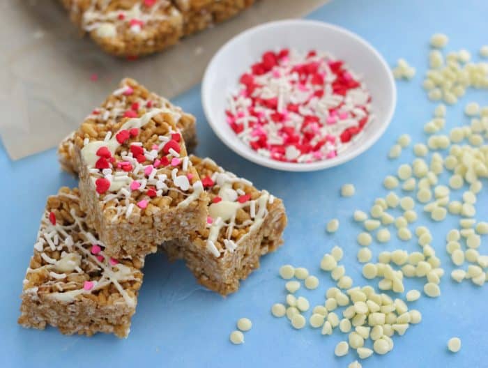 sugar cookie rice crispy treats with white chocolate chips and heart sprinkles