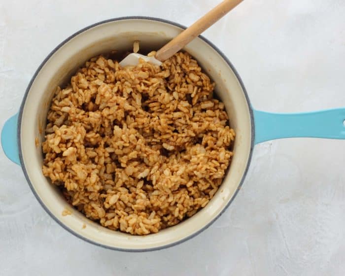 rice crispy treat mix in blue saucepan