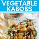 plate of vegetable kabobs with chicken nuggets on green leaf lettuce and dipping sauce