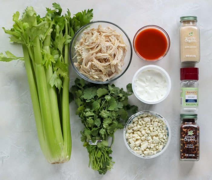 celery, shredded chicken, cilantro, wing sauce, yogurt, blue cheese, garlic powder, salt, red pepper flakes