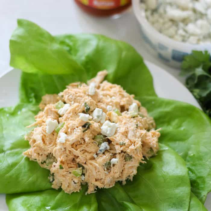 lettuce leaves topped with Buffalo Chicken Salad and blue cheese