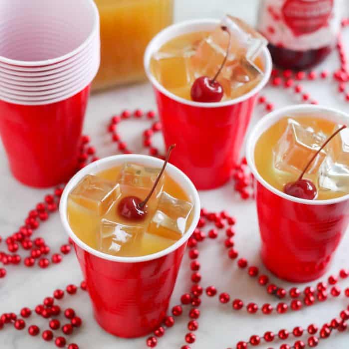 yellowhammer drinks in red cups with cherries on top