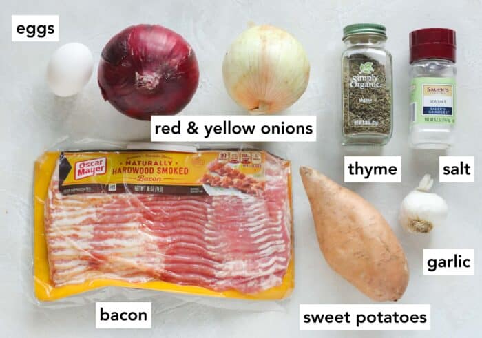 egg, red onion, yellow onion, dried thyme, salt, garlic, sweet potato, bacon with text overlay describing each ingredient