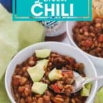 bowl of chili with avocado and spoon with text overlay that says easy, vegan, gluten free lentil chili