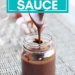 chocolate sauce dripping from a spoon into a clear jar with text overlay