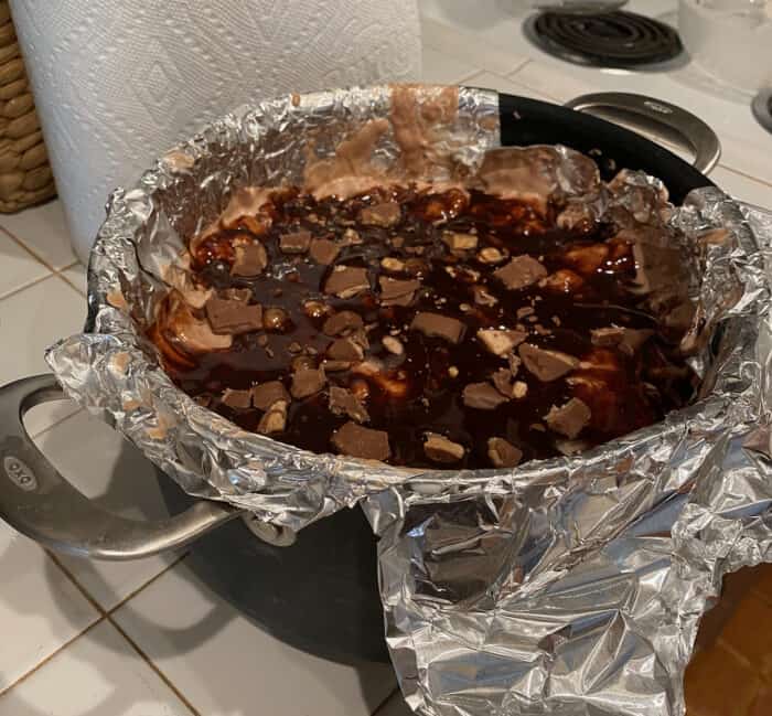 ice cream pie in a soup pot with foil