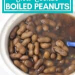 white slow cooker with boiled peanuts and text overlay for pinterest