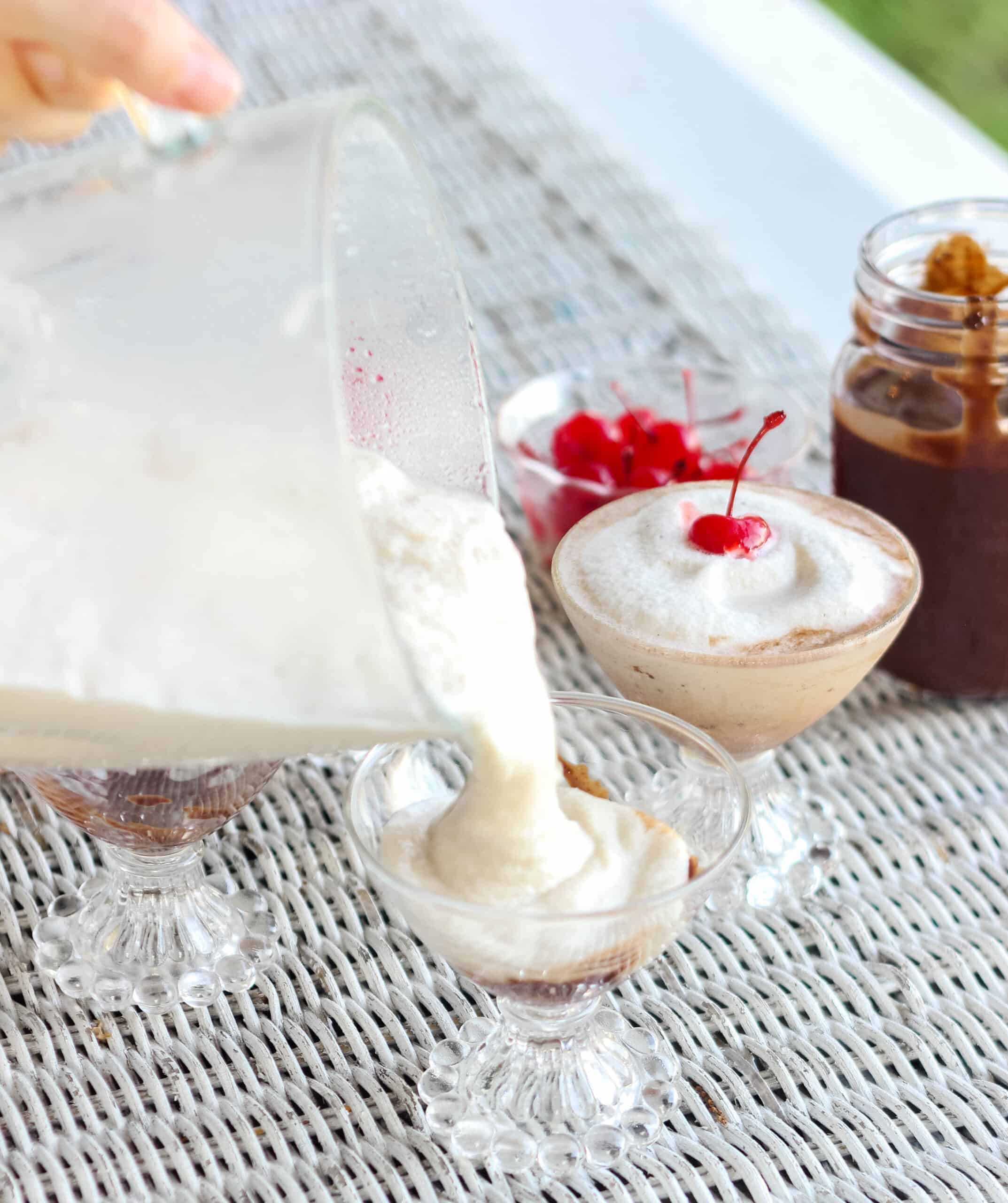 bushwacker being poured into a glass from the blender