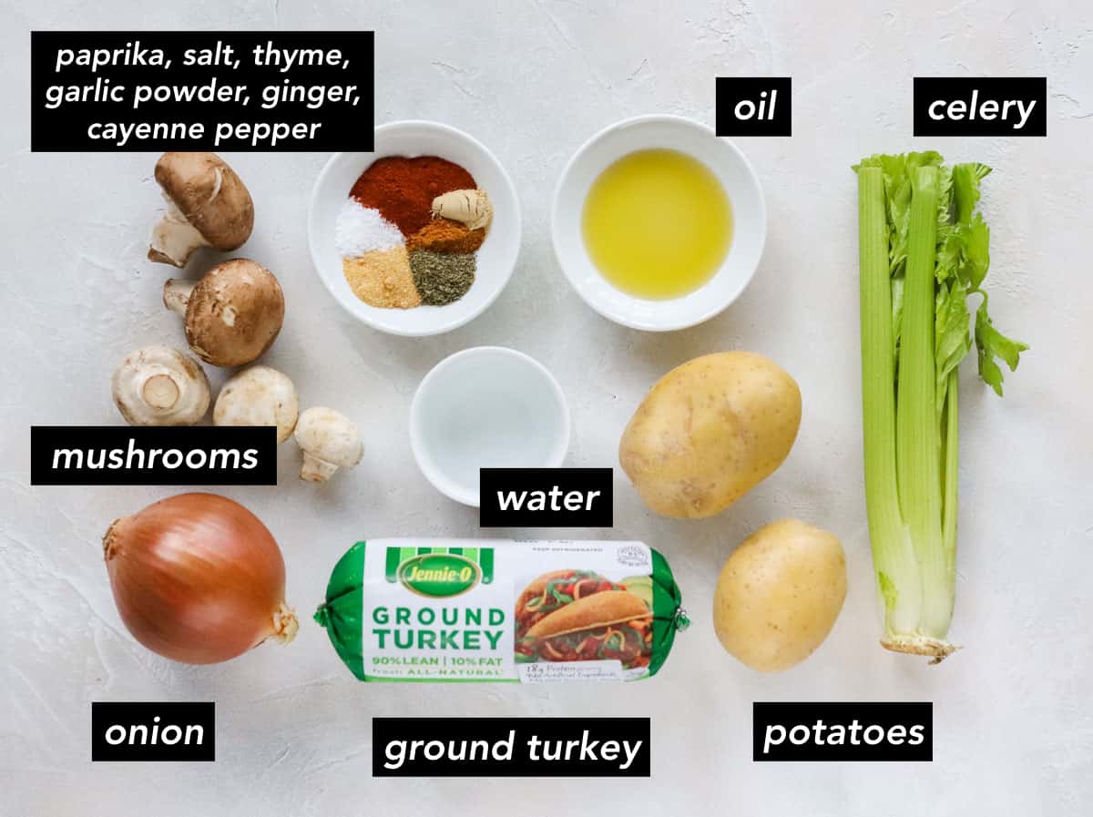 onion, package of ground turkey, potatoes, celery, bowl of water, mushrooms, bowl of spices, bowl of oil