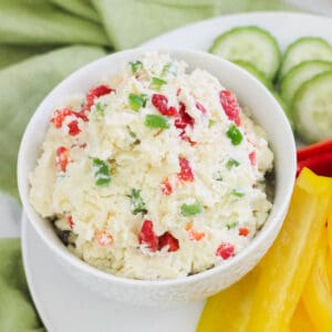 close up of a white bowl with jalapeno pimento cheese.