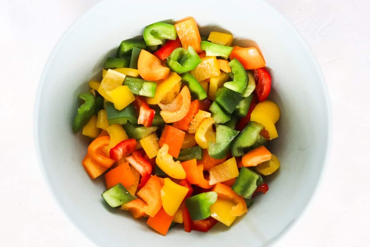bowl of chopped colorful bell peppers.