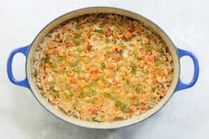 halfway baked crawfish rice casserole before being topped with cheese.