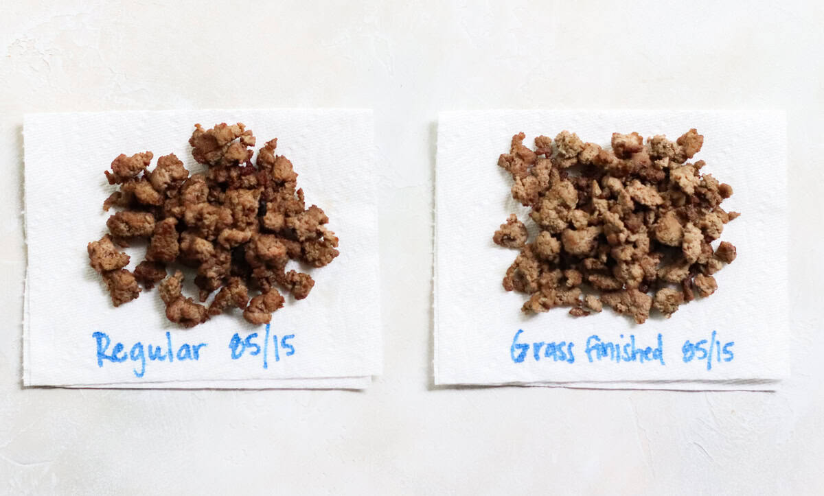 two paper towels with cooked ground beef that says regular 85/15 and grass finished 85/15.