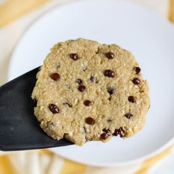 spatula holding a microwave oatmeal chocolate chip cookie.